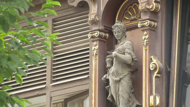 Statue and decorated pilasters