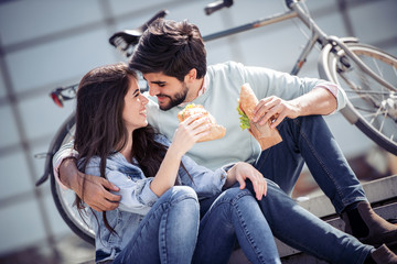 Couple having breakfast outdoors