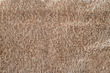 macro texture beige suede. closeup shammy soft leather background