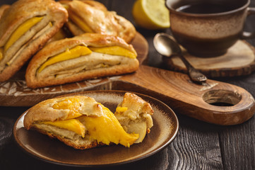 Scones with apple and mango and cup of tea.