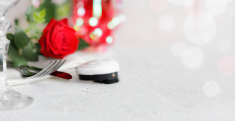 High school graduation party concept. Ylioppilas lakki on Finnish ylioppilas symbol. Close up view of restaurant table with festive table place setting. Copy space