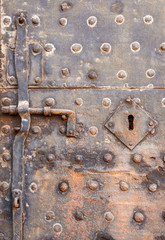 Old iron door and lock with rust