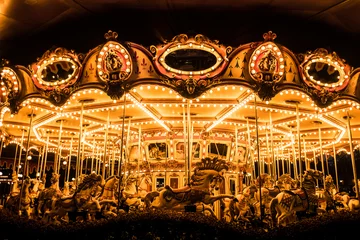 Deurstickers Merry-Go-Round (carousel) illuminated at night.  © KoRn