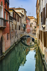 Fototapeta na wymiar Typical Venice canal with gondola, Italy