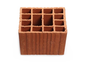 Perforated red brick isolated on white background