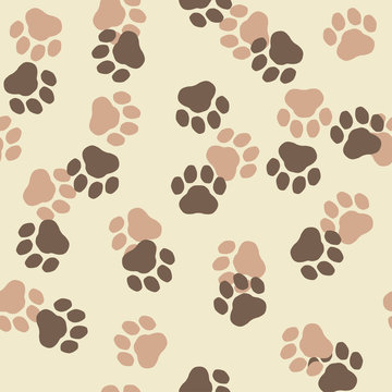 Seamless pattern: Brown cat or dog paw prints on beige background