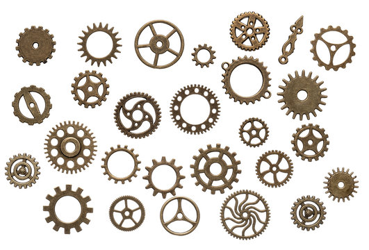 Set of different brass cog wheels isolated on white background