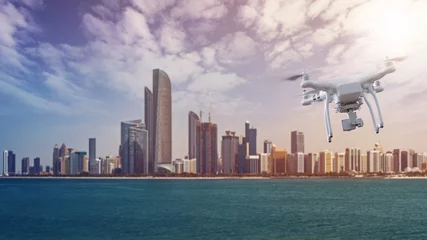 Rucksack Drone flying in front of the Abu Dhabi Skyline © Felix Pergande