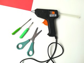 Glue gun, screwdrivers, scissors