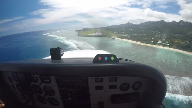 Flying cessna plane cockpit during landing in Rarotonga Cook Islands