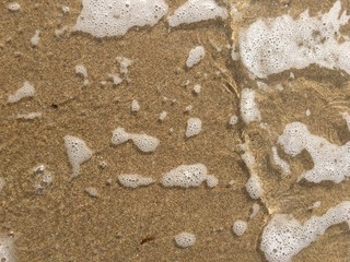 Fototapeta na wymiar Agua en la playa