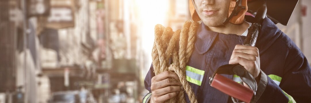 Composite image of professional fireman