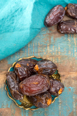 Traditional Middle East dessert, healthy food, big medjool dates fruits.