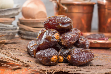 Traditional Middle East dessert, healthy food, big medjool dates fruits.