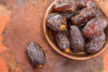 Traditional Middle East dessert, healthy food, big medjool dates fruits.