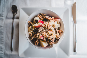 Hotel bowl of cereal on white plate
