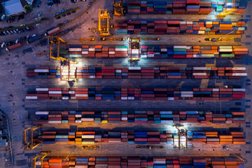 Aerial of containers yard in port congestion with ship vessels are loading and discharging...