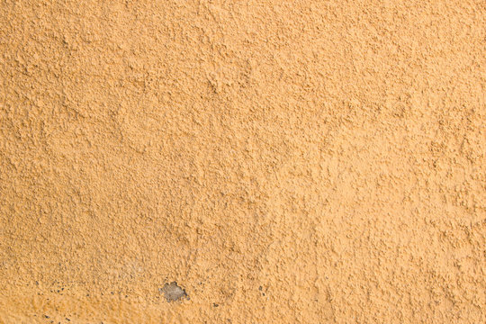Grunge beige wall texture background