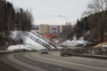 Road and view of the city of Khanty-Mansiysk. Russia