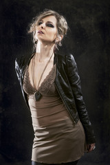 Blond woman in leather jacket