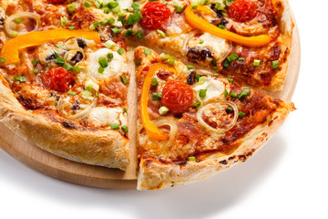 Pizza with ham and vegetables on white background
