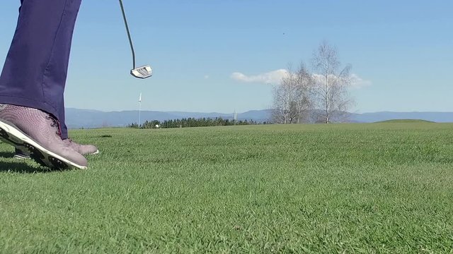 Golfer hit ball on golf course  SLOW MOTION