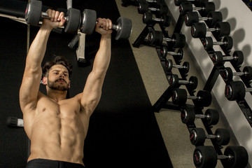 Young man training in the gym