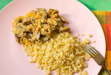 A dish from Bulgur and chicken hearts.