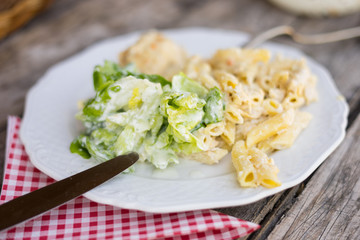 pasta with cheese and salad