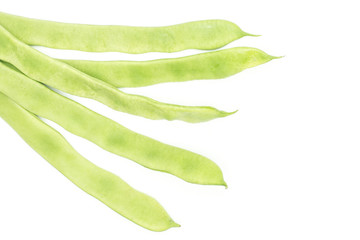 Five flat green beans top view isolated on white background.