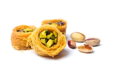 Gordijnen Middle Eastern dessert with pistachio called mabroume © creativefamily