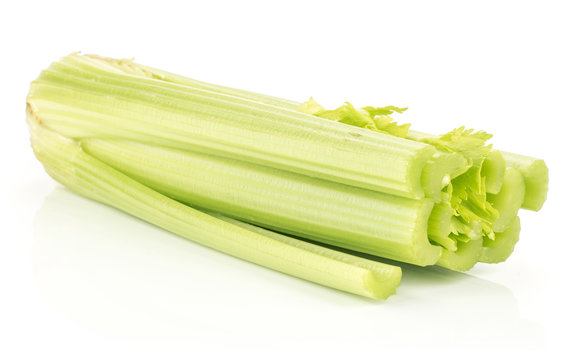 Fresh green celery isolated on white background.