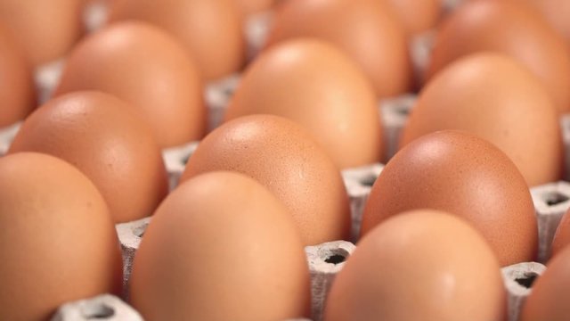 Uncooked eggs. Rotating and closeup