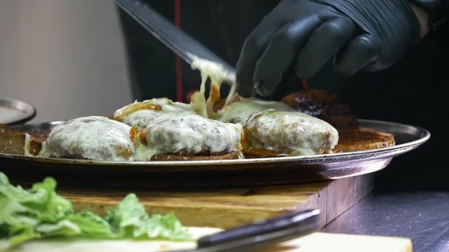 Fresh burgers on the plate - commercial kitchen