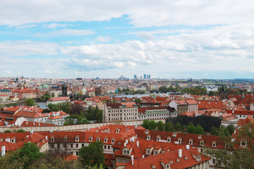 Fototapeta na wymiar view from top of the capital of the Czech Republic. Red brick roofs of Prague. popular view for tourism