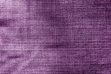 Fototapeta premium Jeans cloth pattern in purple color.