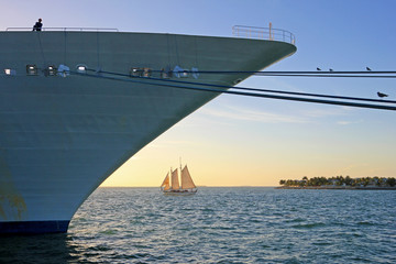 Big cruise ship and small sailing boat, size comparison, Key West, Florida the Sunshine State, USA