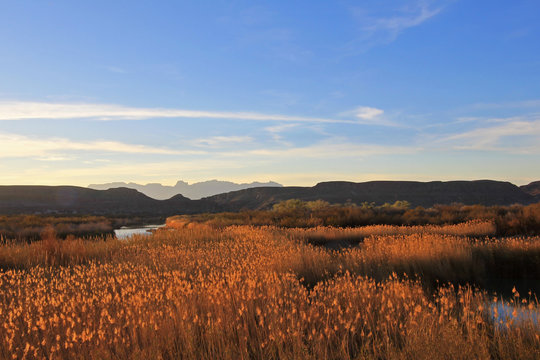 Rio Grande River Flowing Through The Big Bend National Park At Sunset, Texas, USA