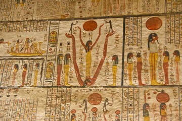 Hieroglyphs on the wall in King Tut's Tomb in the Valley of Kings in Luxor, Egypt - obrazy, fototapety, plakaty