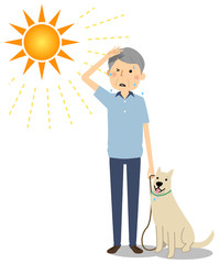 高齢者男性　日差し　犬の散歩