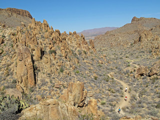 Unrecognizable hikers on the Grapevine Hills trails, Big Bend National Park, Texas, USA