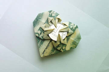 an American note in the form of a heart with tentacles absorbed a Russian coin with a nominal value...