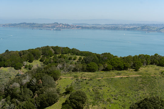 Wide sweeping view of Tiburon, the Marin Headlands and surrounding bay seen from up high on Angel Island