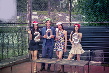 Young people are celebrating New Year's party.