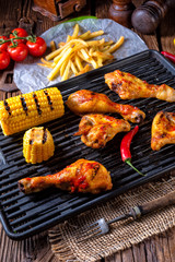 Rustic Grilled chicken wings,legs,and spicy corn