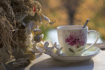 cup of tea by the lake . spring concept