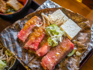 Grilled beef on leaf in Japan