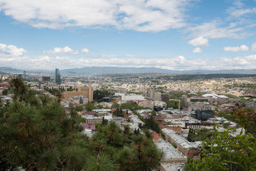 Fototapeta na wymiar Picturesque landscape of the capital of Georgia, Tbilisi. Top view.