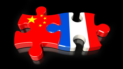 China and France flags on puzzle pieces. Political relationship concept.