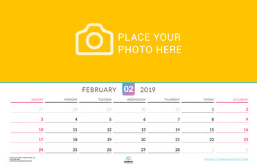 Wall calendar for February 2019. Vector design print template with place for photo. Week starts on Sunday. Landscape orientation